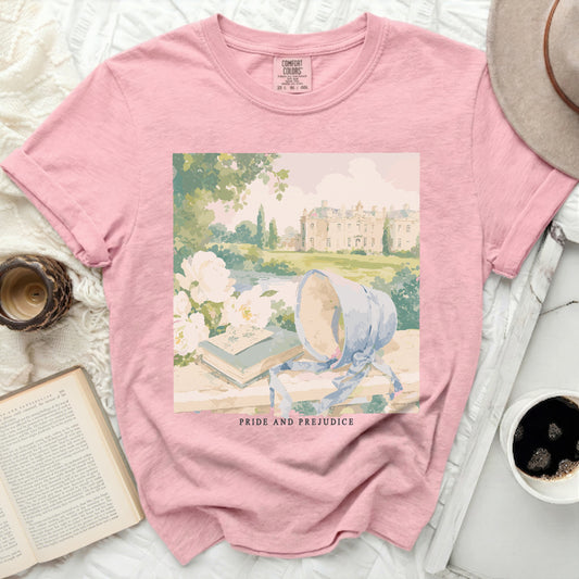 Pink t-shirt with Jane Austen's Pride and Prejudice book and bonnet graphic.