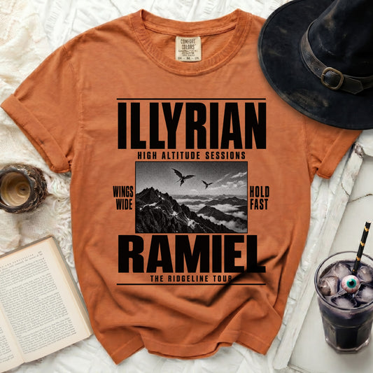 Orange t-shirt with "ILLYRIAN HIGH ALTITUDE SESSIONS RAMIEL THE RIDGELINE TOUR" text.