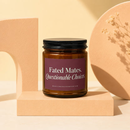 Amber glass candle with purple label reading "Fated Mates. Questionable Choices."