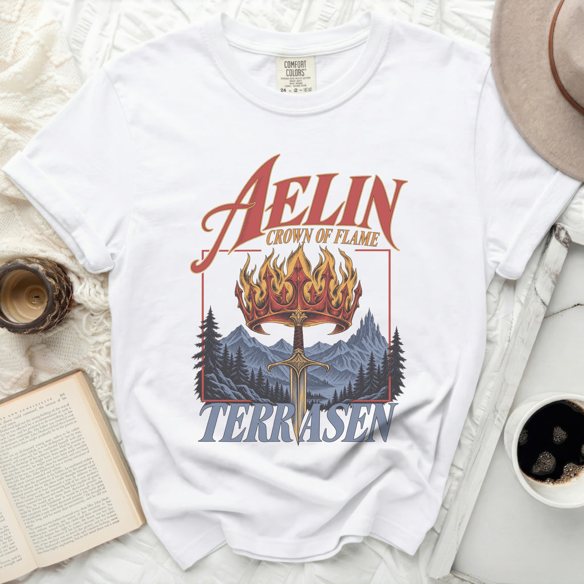 White t-shirt with Aelin Crown of Flame and Terrasen text and graphic design.