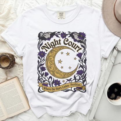 White t-shirt with "Night Court" text, crescent moon, stars, and flowers.