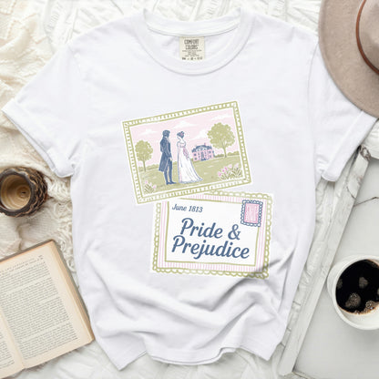 White t-shirt with "Pride & Prejudice" graphic and Regency couple.