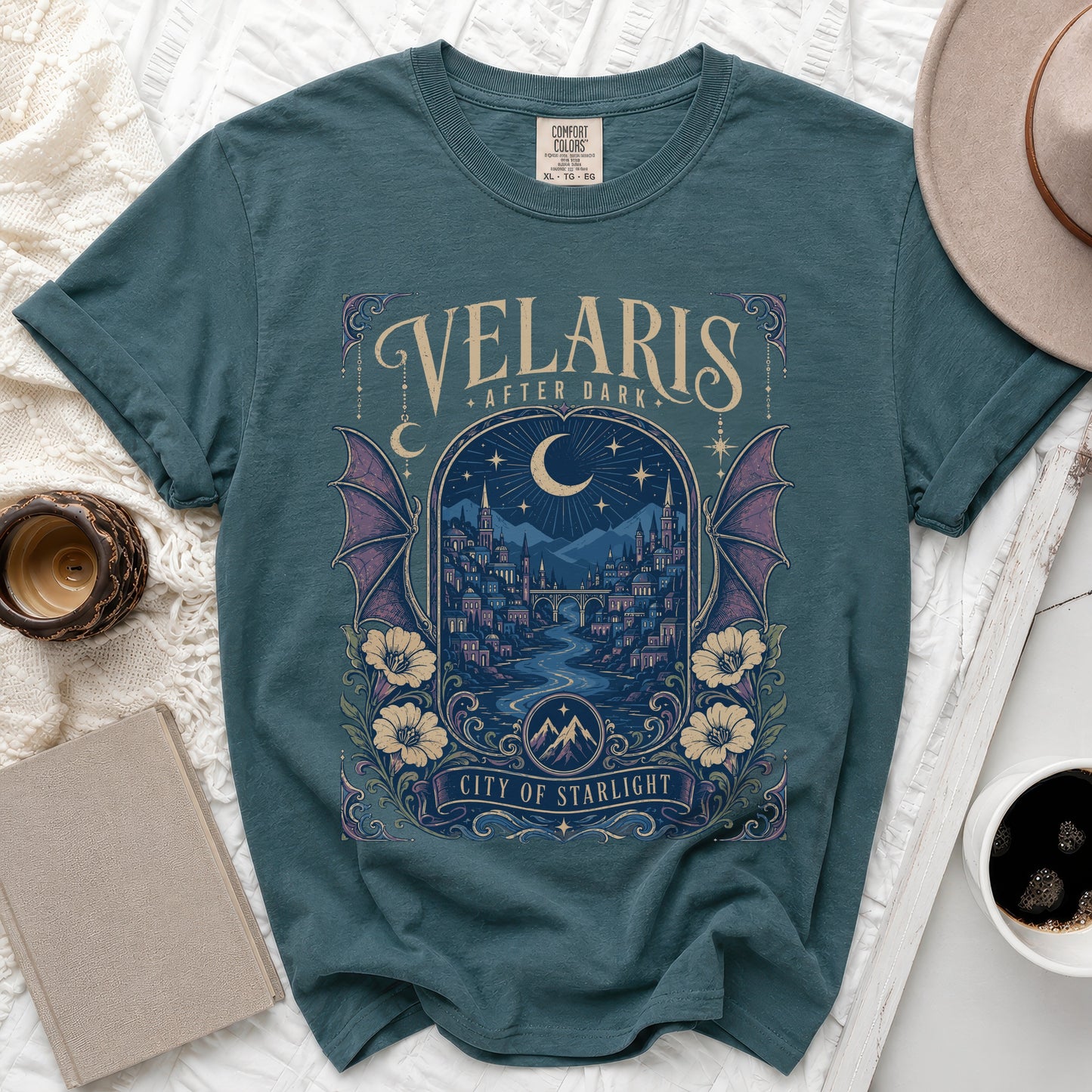 Teal t-shirt with "Velaris After Dark City of Starlight" graphic and city scene.