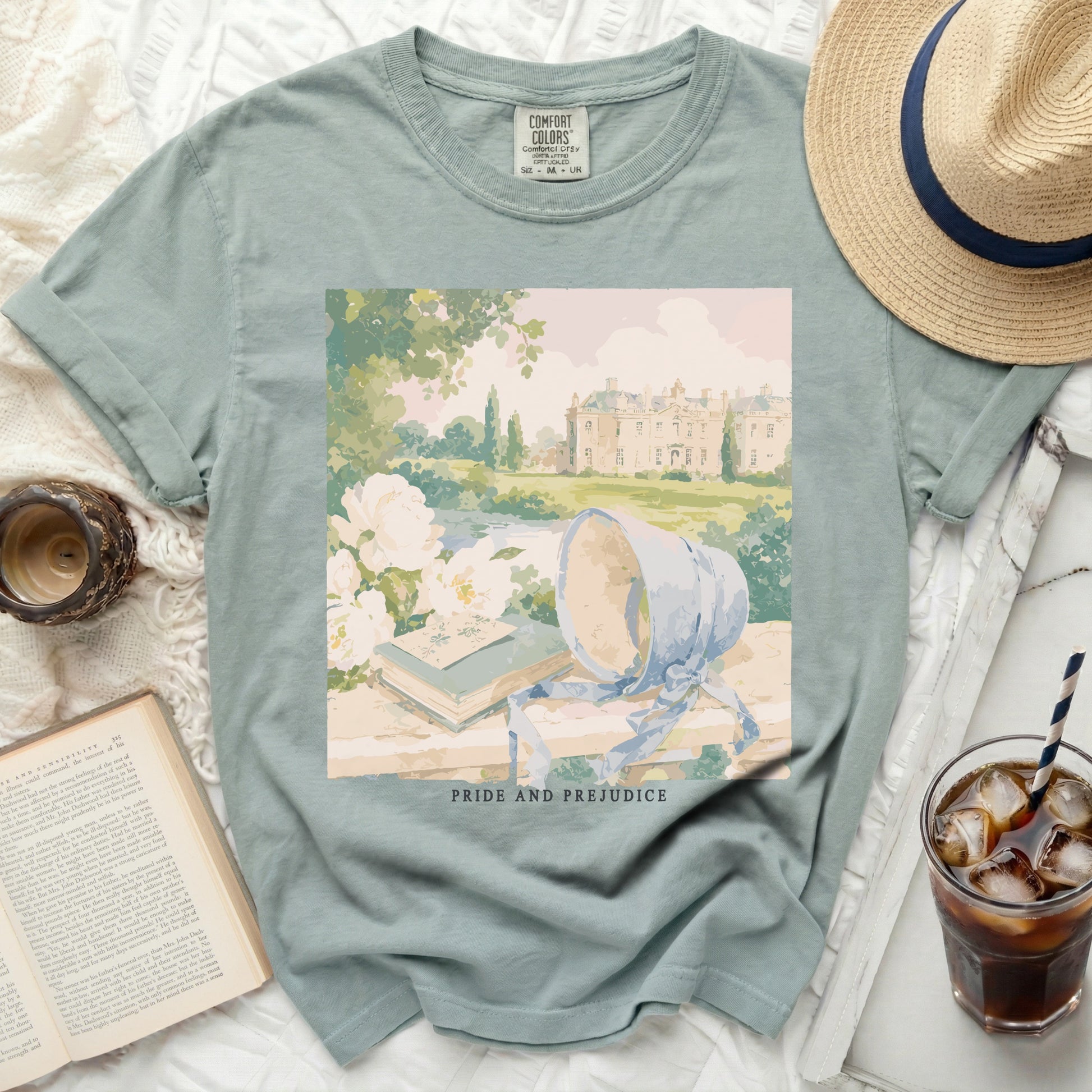 T-shirt with "Pride and Prejudice" painting of a manor and bonnet.