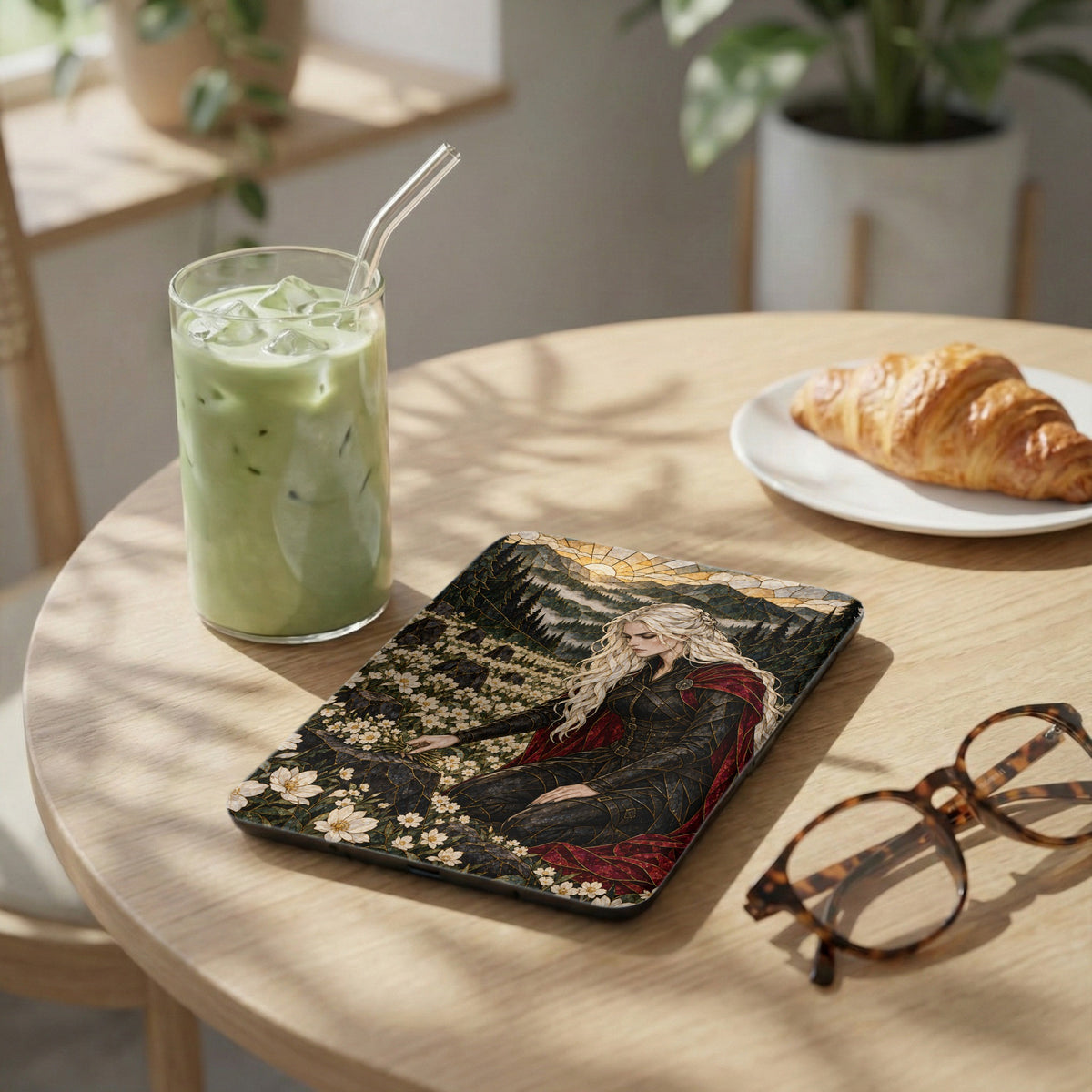 Tablet case with fantasy art of a woman with blonde hair and a red cloak.