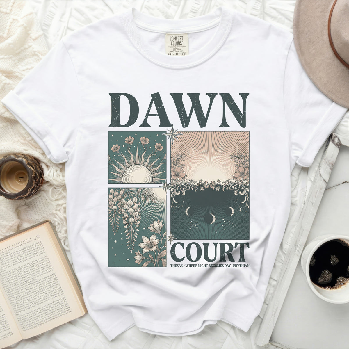 White t-shirt with "DAWN COURT" text and celestial graphics.