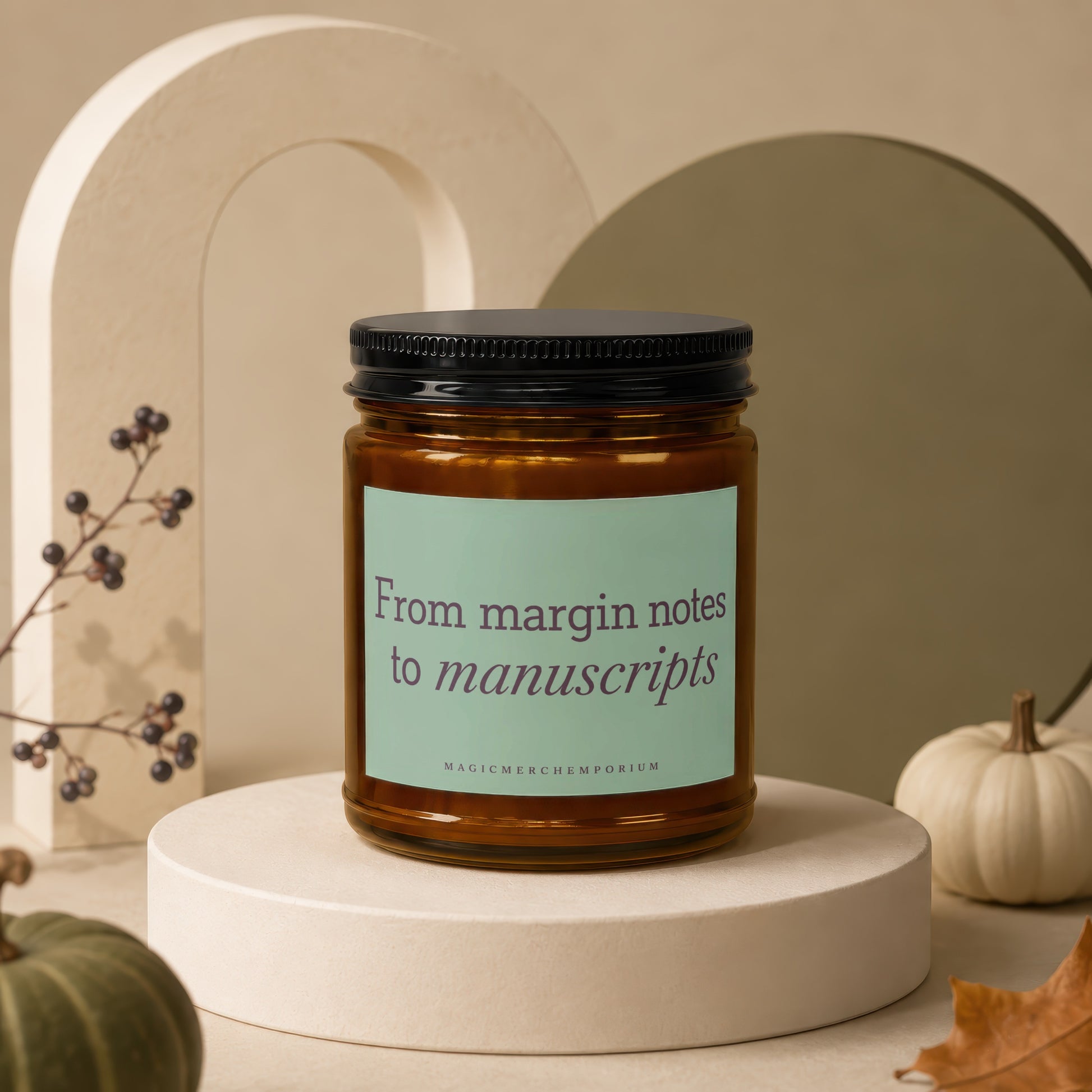 Amber glass candle with "From margin notes to manuscripts" text on a light blue label.