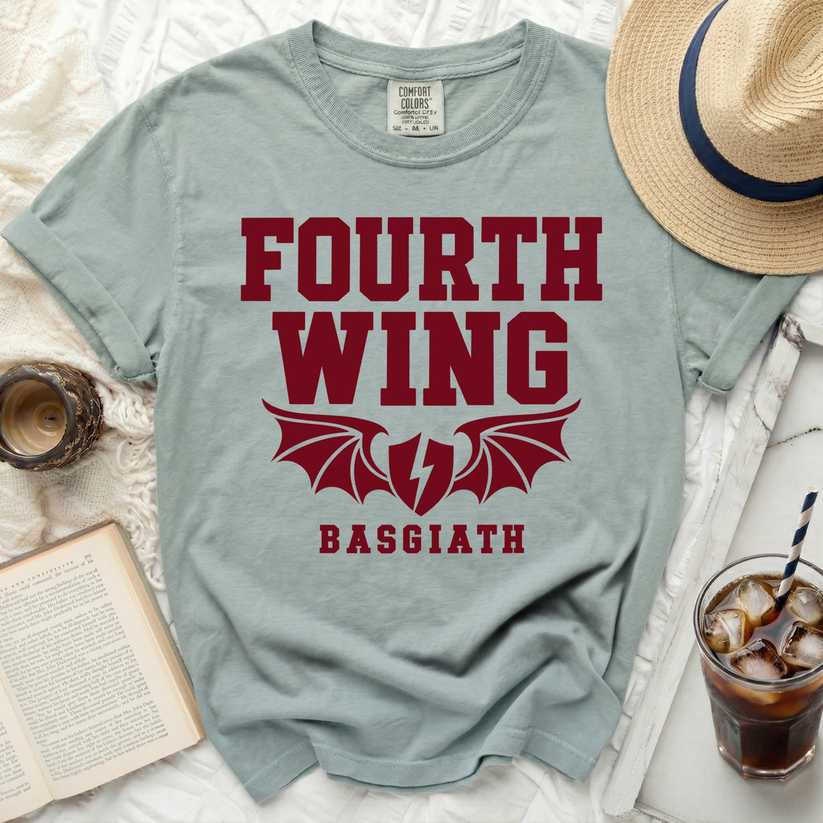 Light blue t-shirt with maroon text "FOURTH WING BASGIATH" and a lightning bolt wing design.