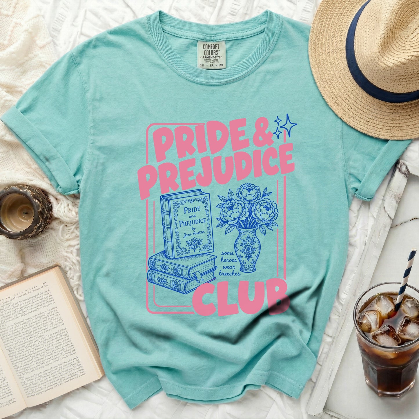 Turquoise t-shirt with "Pride & Prejudice Club" design and Austen book illustration.