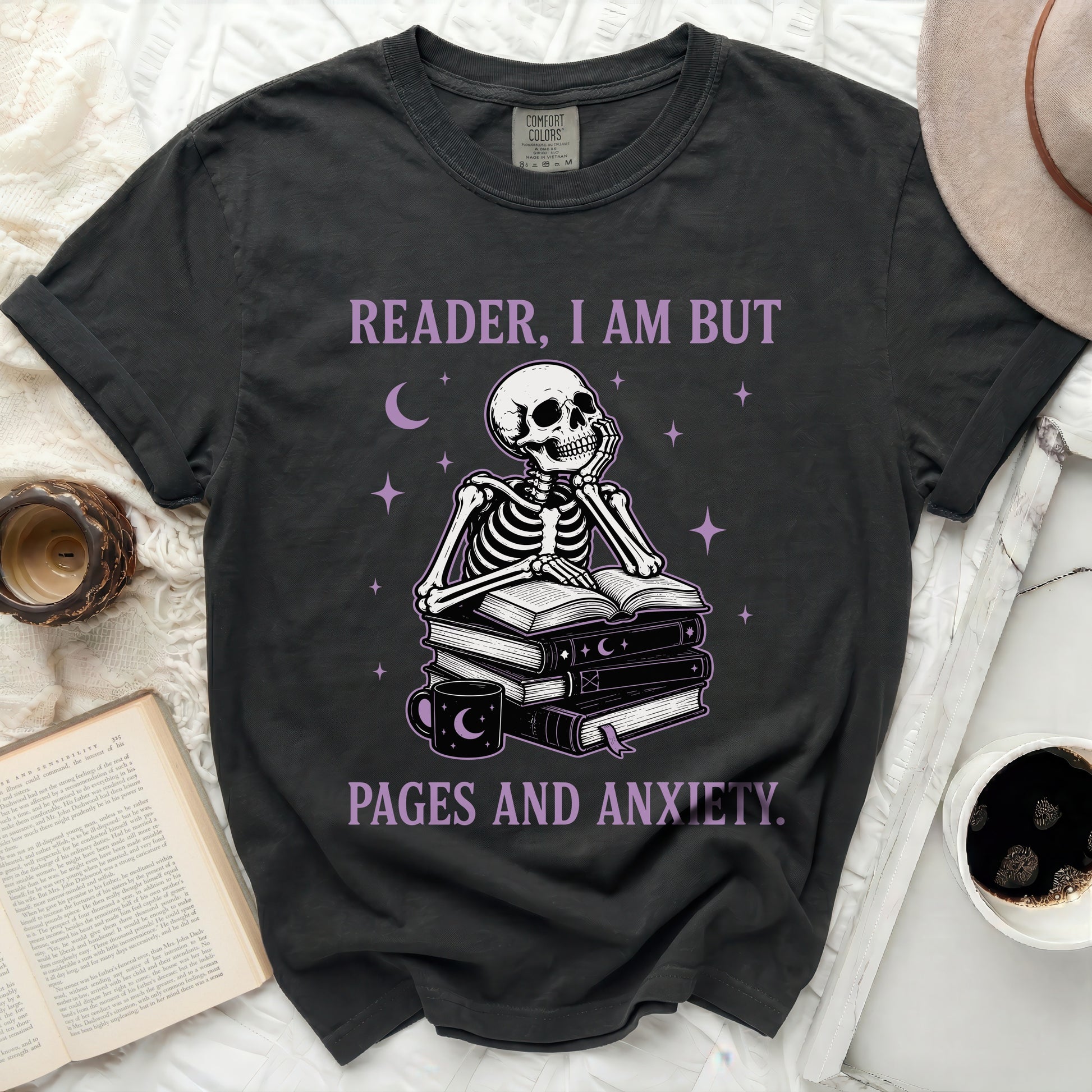 Skeleton reading books with text "READER, I AM BUT PAGES AND ANXIETY."