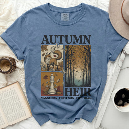 Blue t-shirt with "Autumn Heir" design featuring a fox, chess piece, and forest scene.
