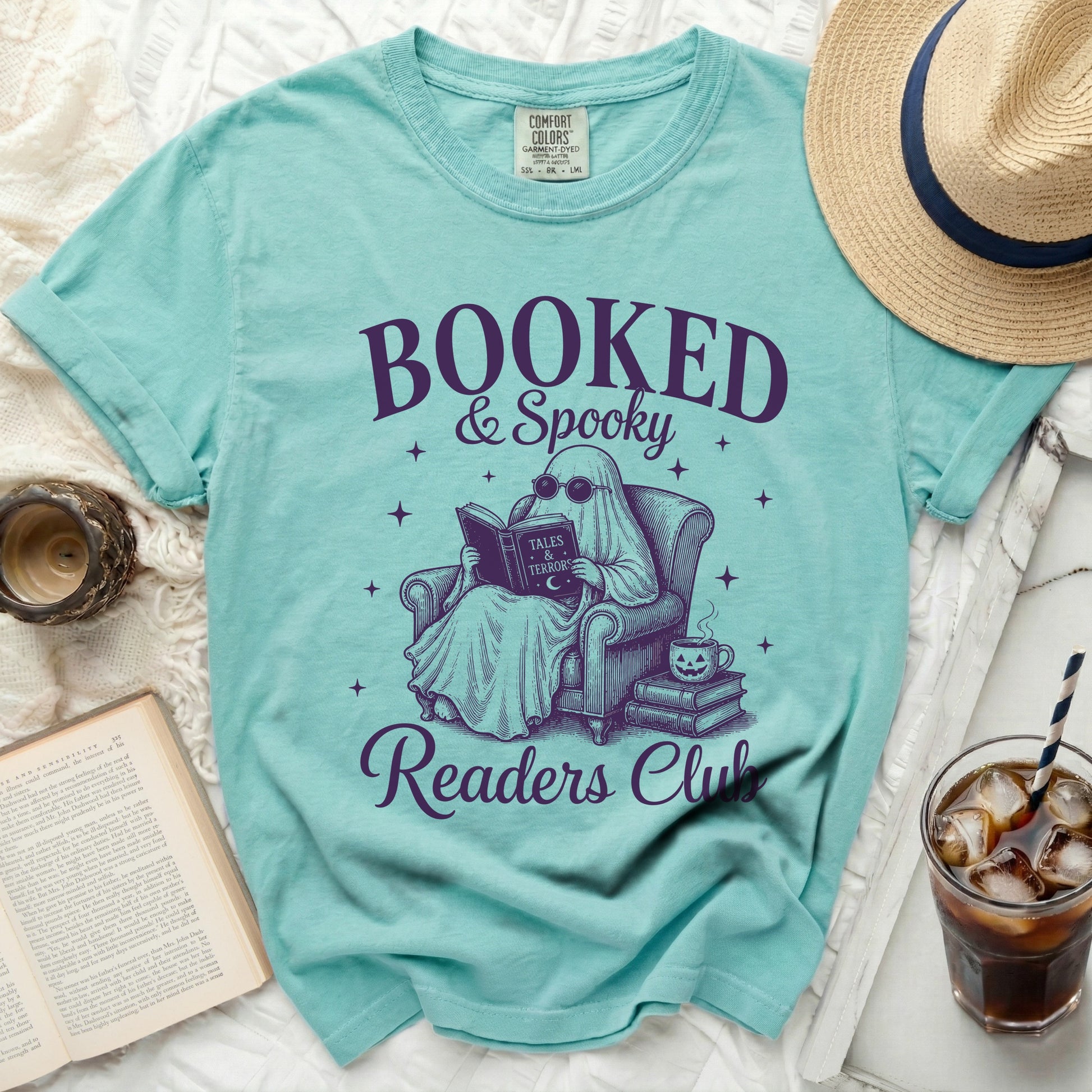 Teal t-shirt with ghost reading "Booked & Spooky Readers Club" design.