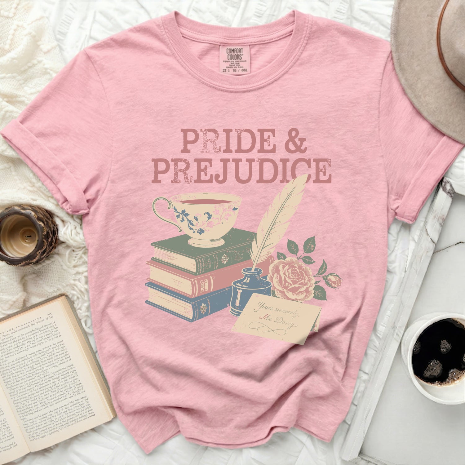 Pink t-shirt with "Pride & Prejudice" book graphic and Mr. Darcy note.