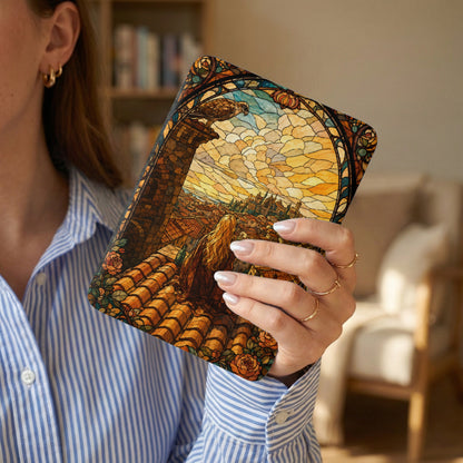 Stained glass pattern tablet cover with a bird overlooking a city skyline.