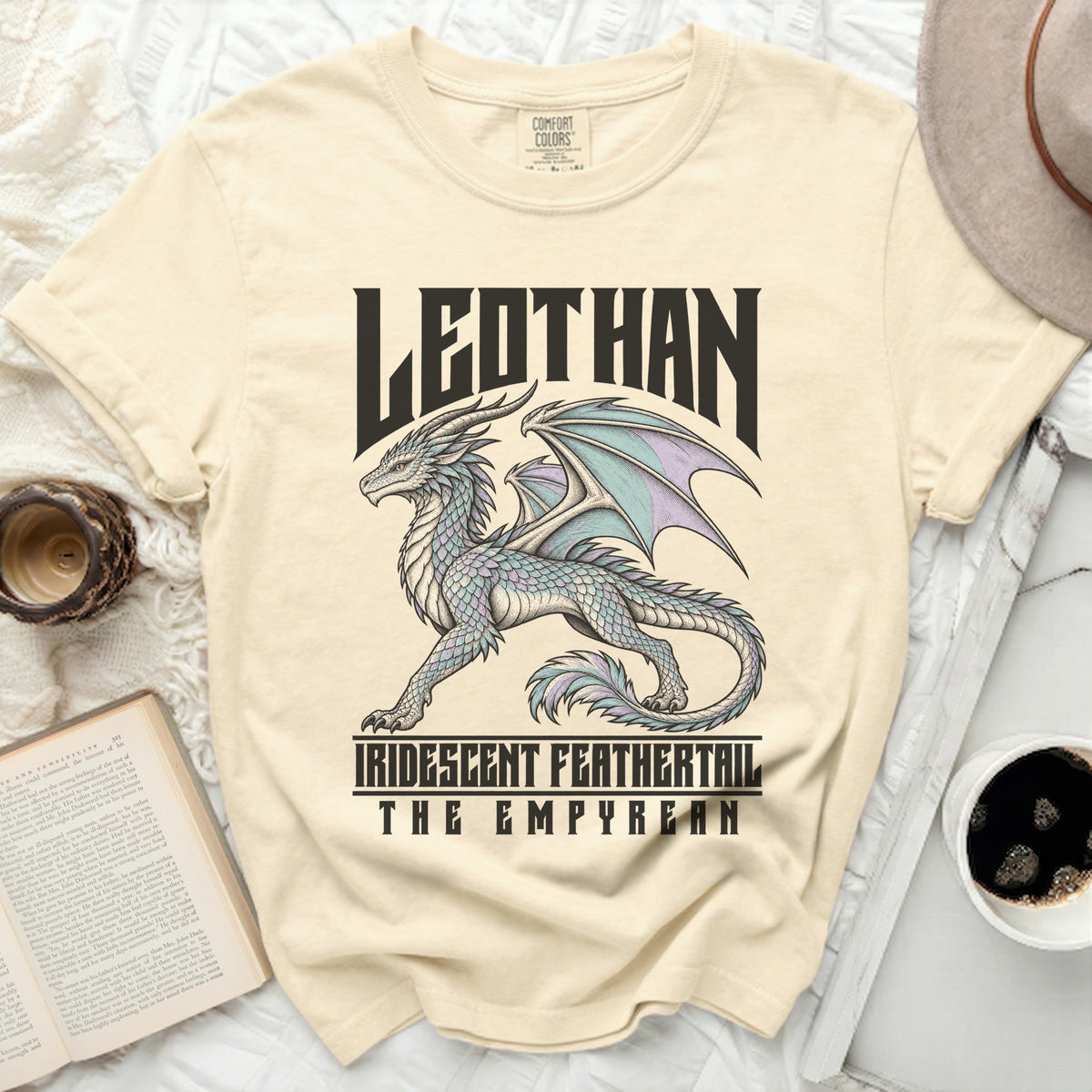 Cream t-shirt with text "LEDTHAN" and iridescent dragon graphic.