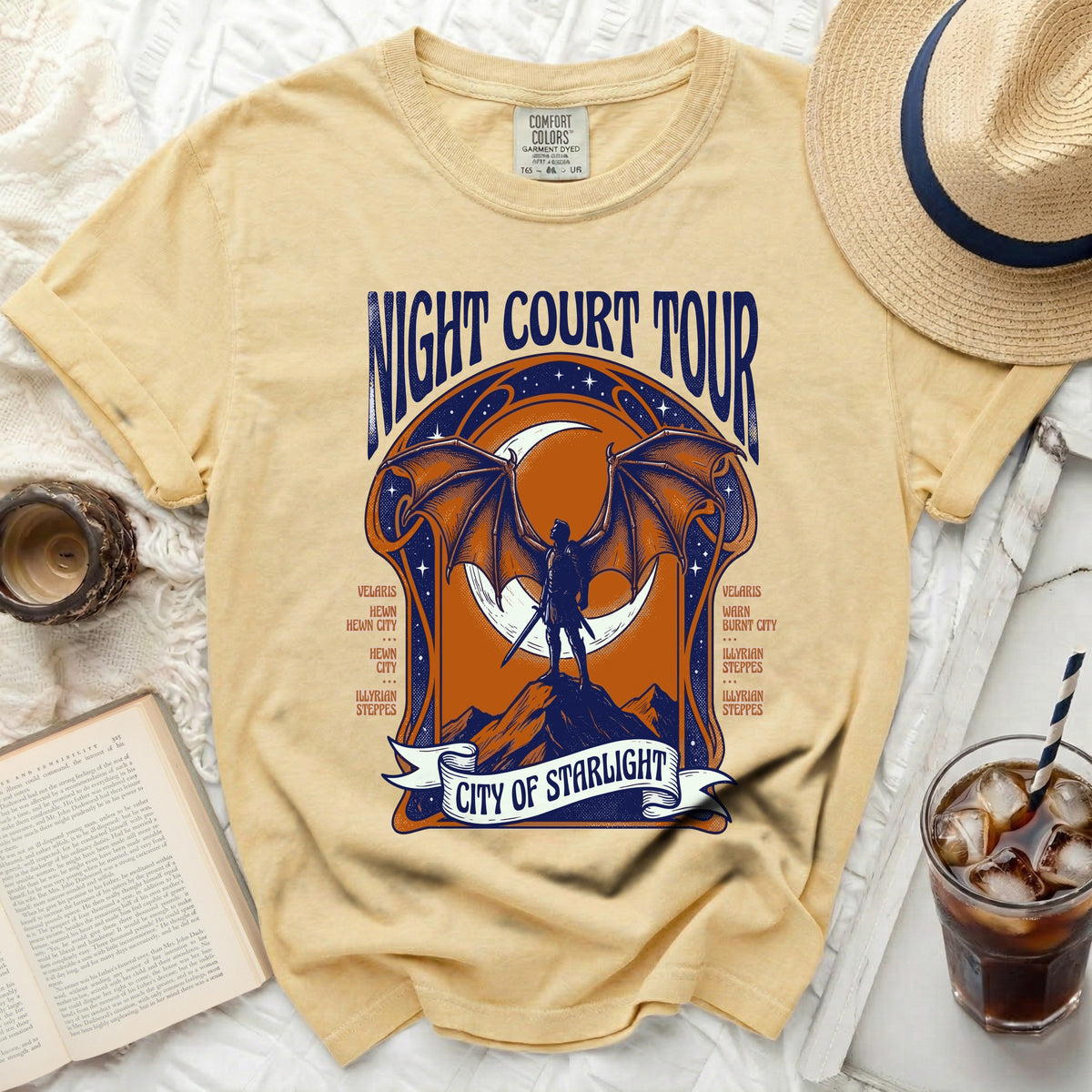 Yellow Comfort Colors t-shirt with "Night Court Tour" and "City of Starlight" graphics.