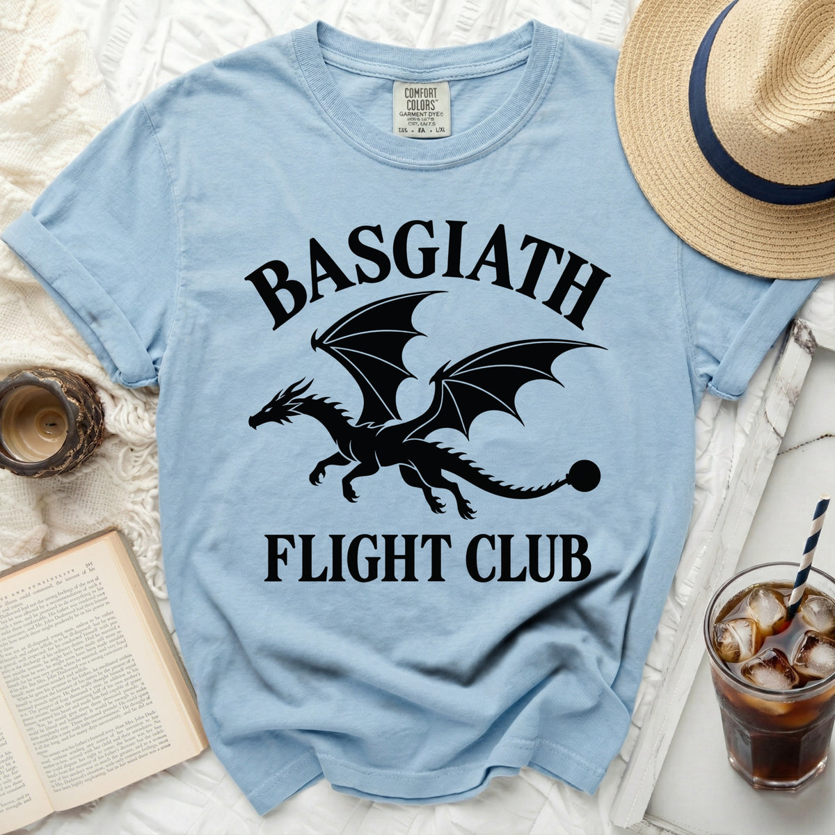 Light blue t-shirt with black dragon and text "BASGIATH FLIGHT CLUB".