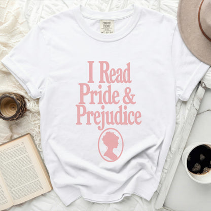 White t-shirt with pink text "I Read Pride & Prejudice" and silhouette.