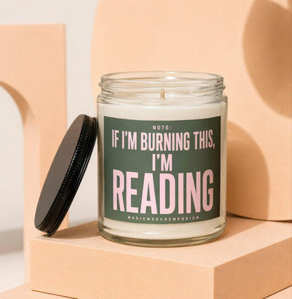 Candle with text "If I'm burning this, I'm reading" on a dark green label