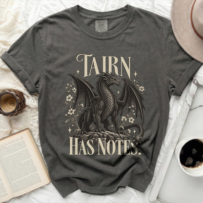 Grey t-shirt with a dragon and flowers graphic, reading "TAIRN HAS NOTES".