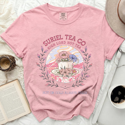Pink Comfort Colors t-shirt with Suriel Tea Co. graphic and text.