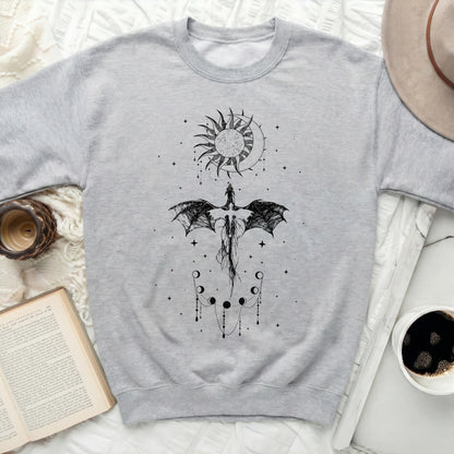 Light gray sweatshirt with black dragon, sun, moon, and phases of the moon graphic.