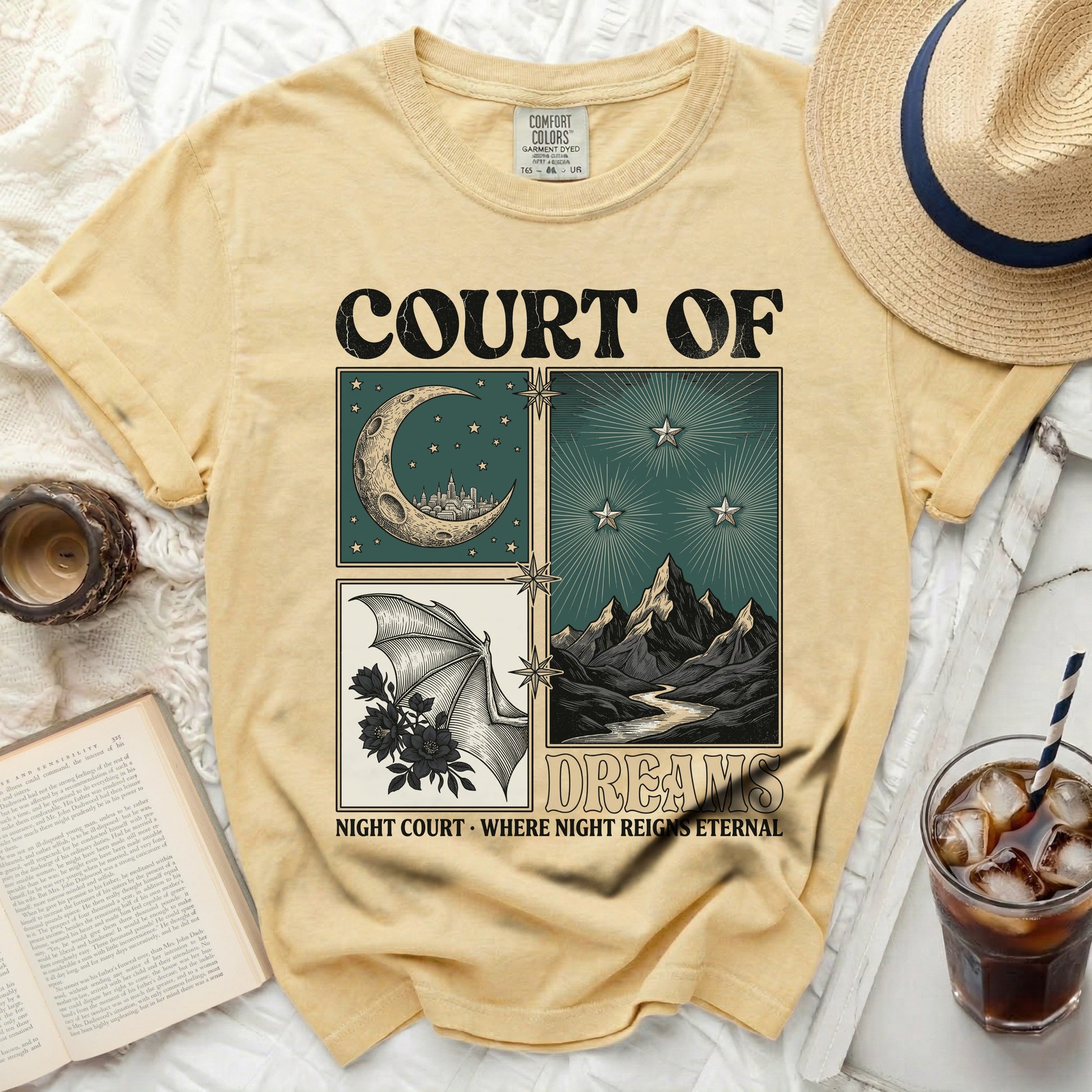 Yellow t-shirt with "COURT OF DREAMS" and illustrated scenes.