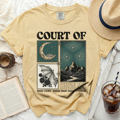 Yellow t-shirt with "COURT OF DREAMS" and illustrated scenes.