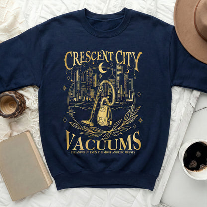 Navy sweatshirt with gold "Crescent City Vacuums" graphic and slogan.