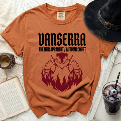 Orange t-shirt with Vanserra, The Heir Apparent/Autumn Court text and armor graphic.
