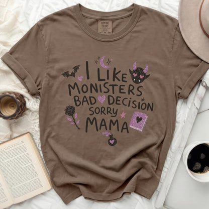 T-shirt with "I like monsters bad decision sorry mama" text and playful graphics.