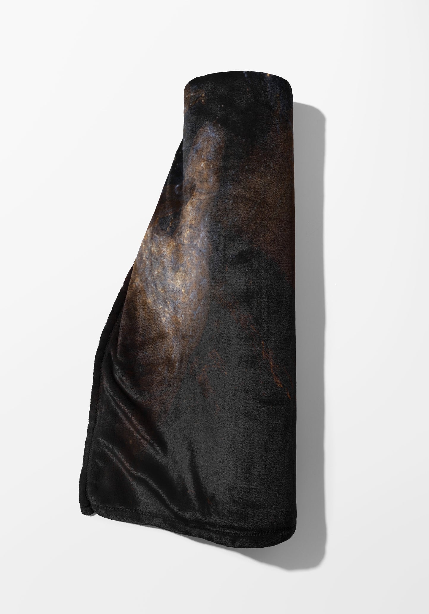 Rolled black blanket with a dark, textured marble-like print.