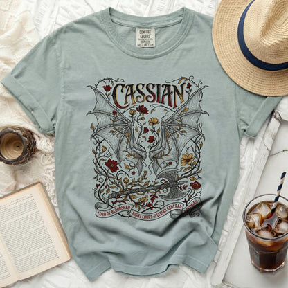 Cassian shirt with dragon wings, axe, and floral design, "Lord of Bloodshed" text.