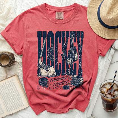 Crimson t-shirt with "Hockey Romance Reader" graphic and books.