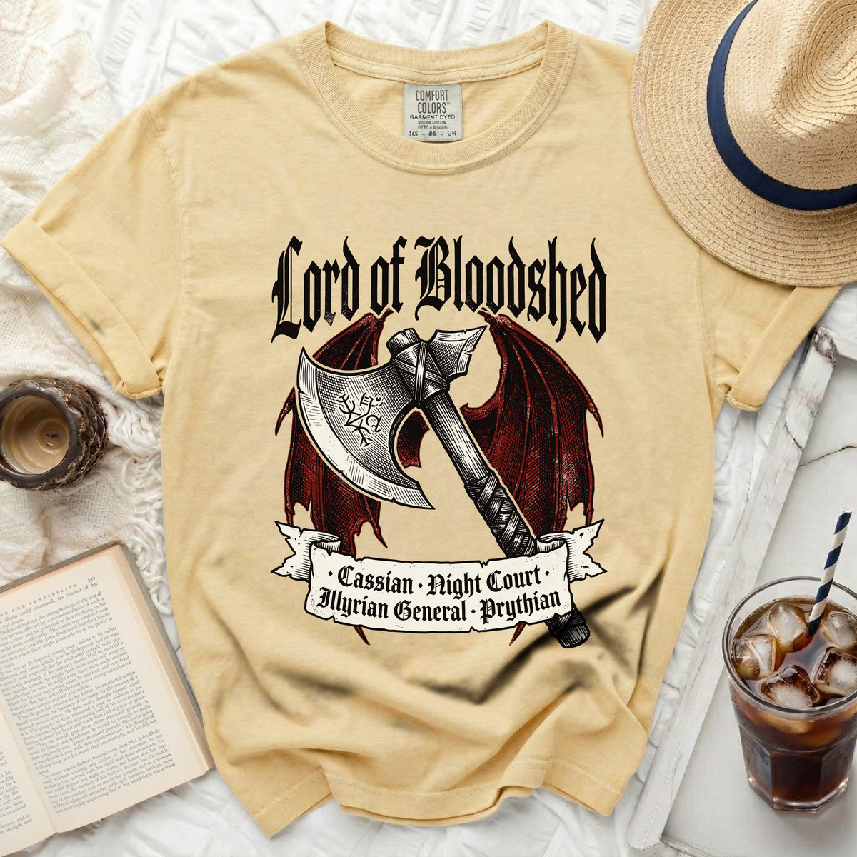 Yellow t-shirt with "Lord of Bloodshed" text and axe graphic.