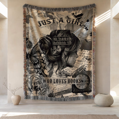 a large tapestry hanging on a wall, depicting a woman surrounded by various books and a butterfly. The tapestry has a text that reads "Just a girl who loves books".