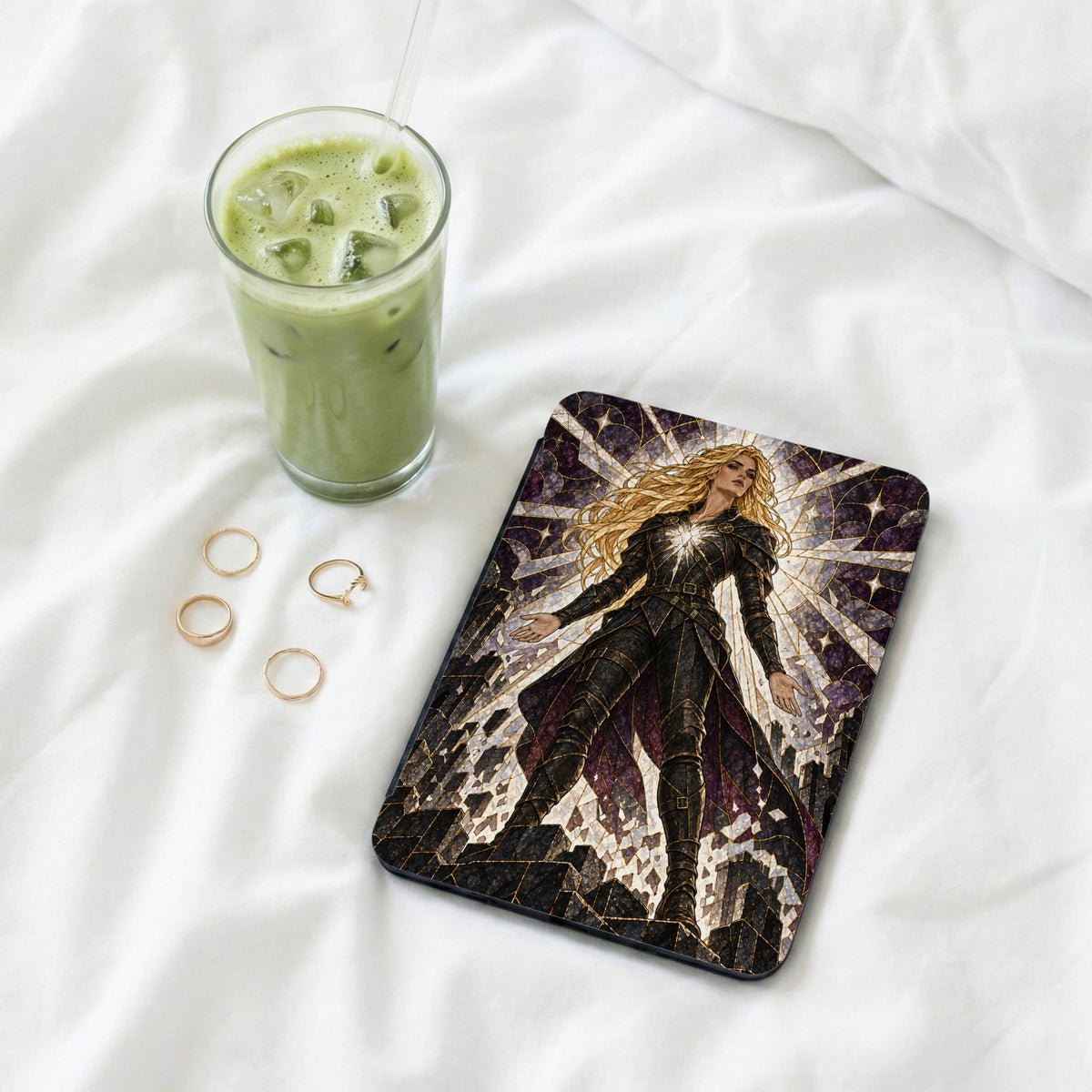 Book cover art of a blonde woman in armor with a stained-glass background.