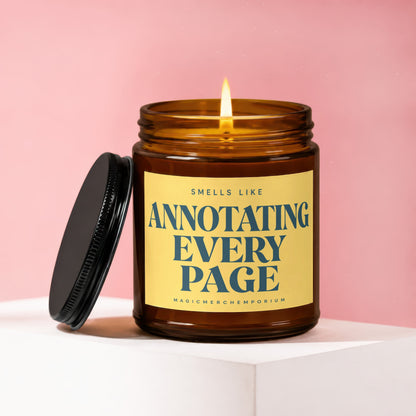 Glass candle with lit flame smells like annotating every page.