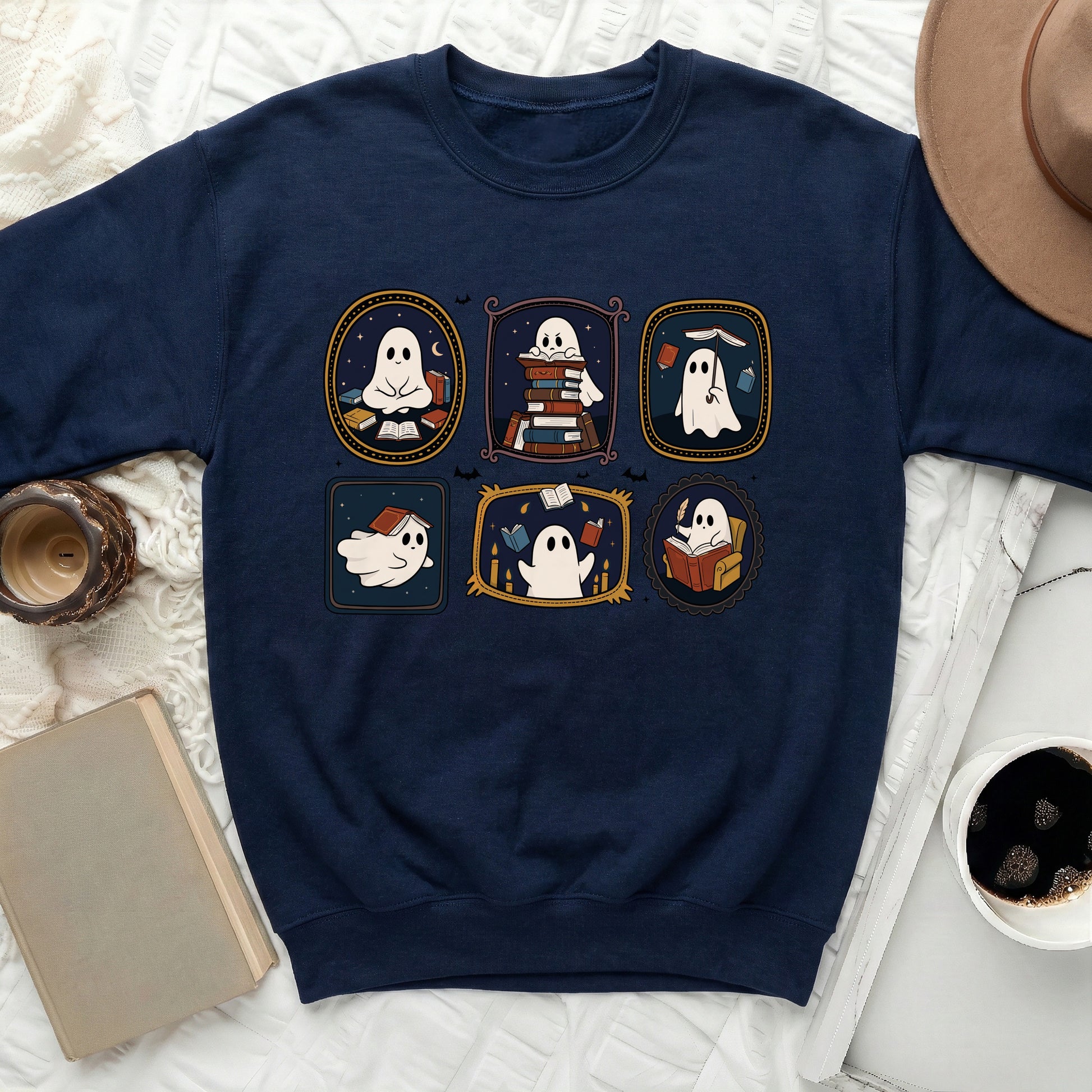 Navy sweatshirt featuring five framed cartoon ghosts reading books.