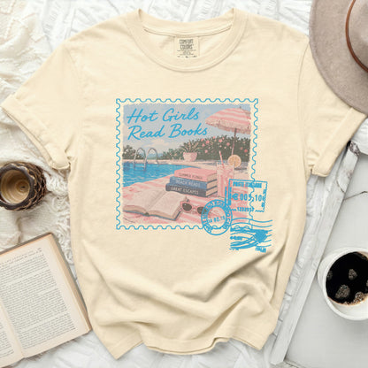 Cream t-shirt with "Hot Girls Read Books" stamp graphic and poolside imagery.