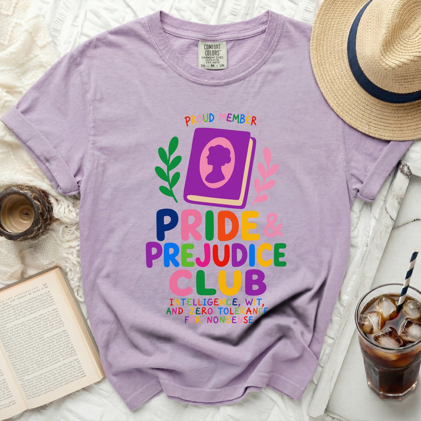 Lavender t-shirt with Pride & Prejudice Club graphic and book graphics.