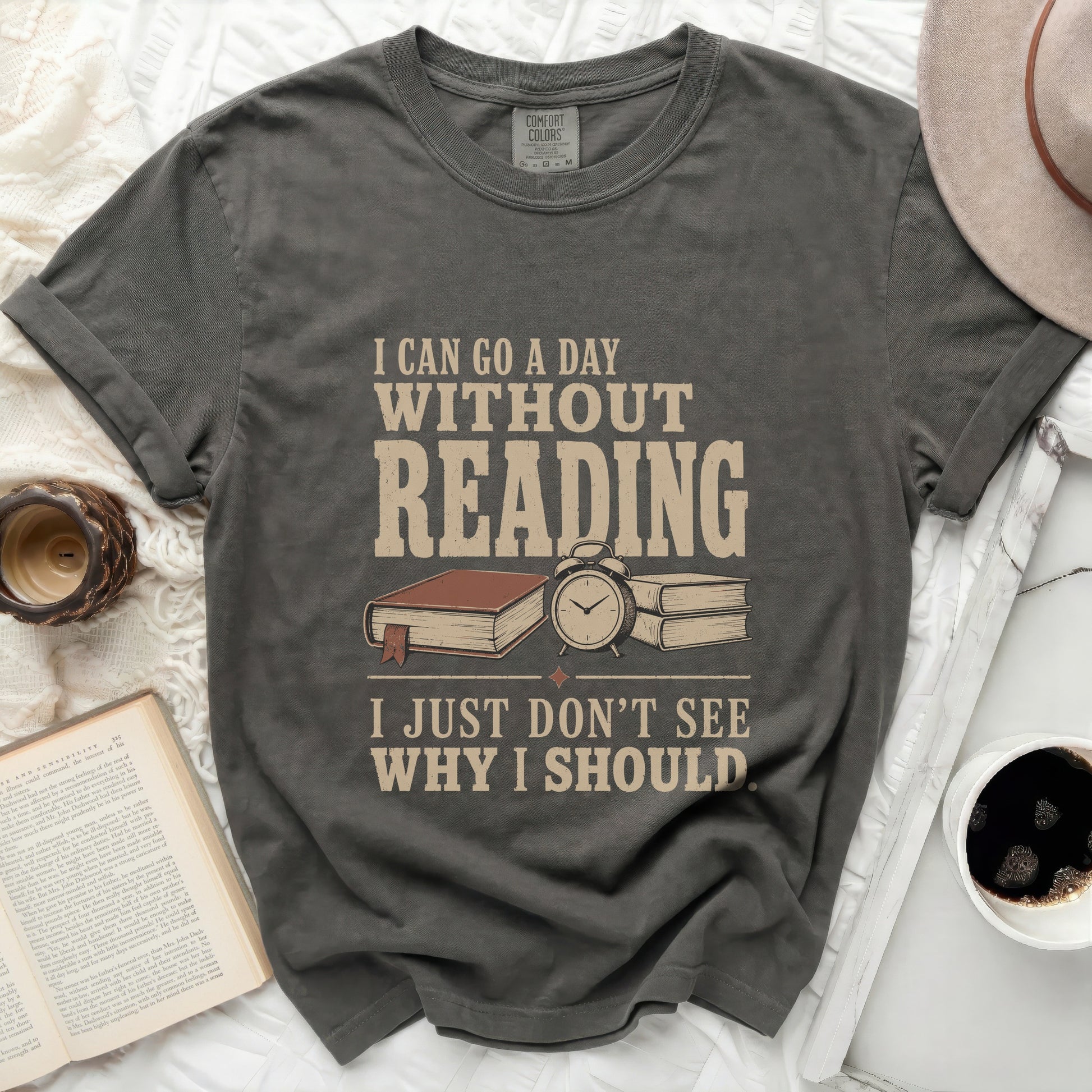 Graphic tee with the text "I CAN GO A DAY WITHOUT READING I JUST DON'T SEE WHY I SHOULD".