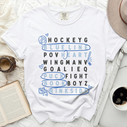 White t-shirt with word game featuring hockey terms and heart.