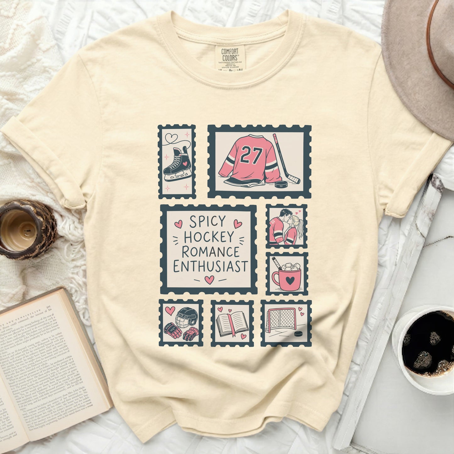 T-shirt with hockey and romance themed stamps and text.