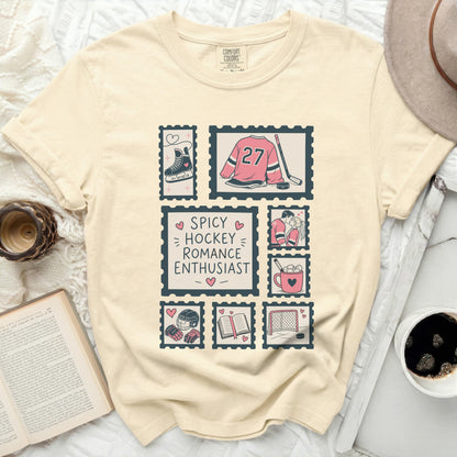 T-shirt with hockey and romance themed stamps and text.