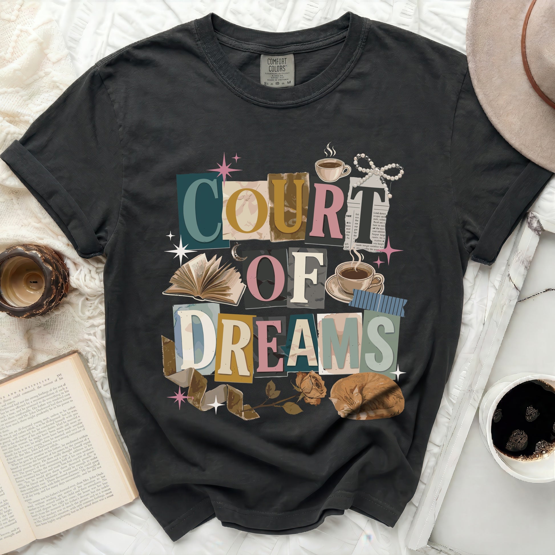 Black Comfort Colors t-shirt with "Court of Dreams" text and graphic elements.