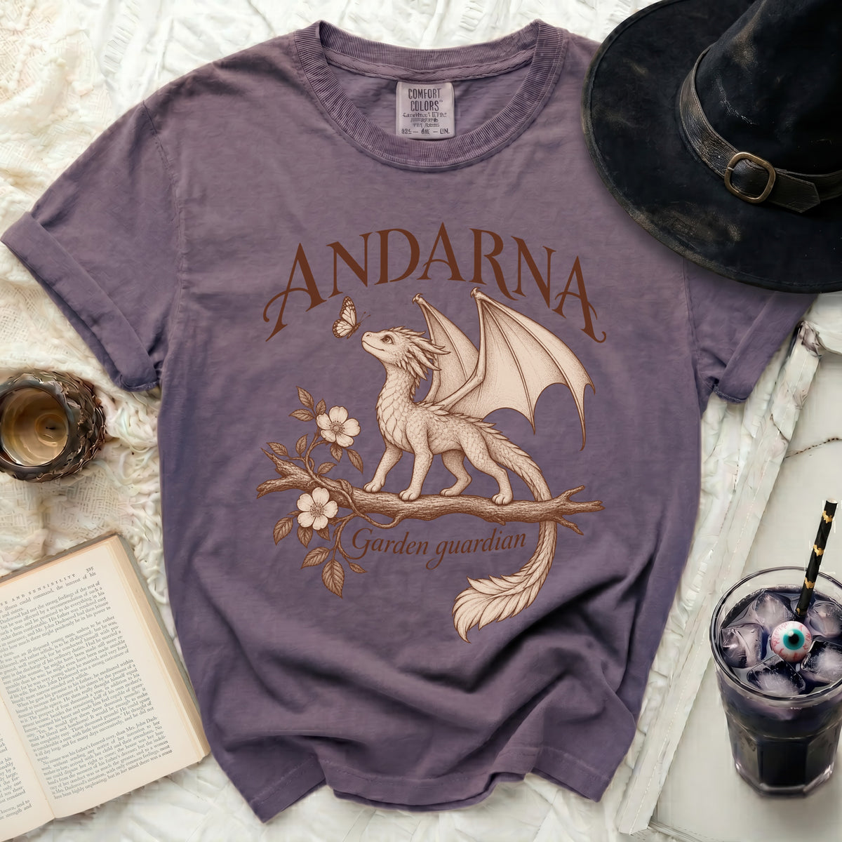 Purple t-shirt with "ANDARNA Garden guardian" text and dragon design.