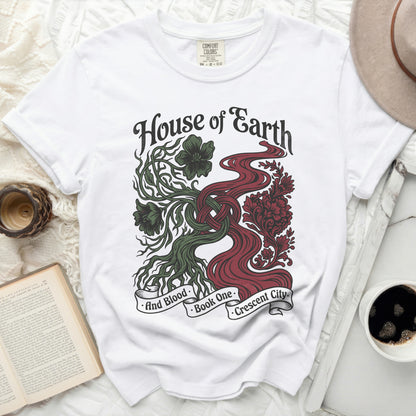 White t-shirt with red and green "House of Earth and Blood Book One Crescent City" design.