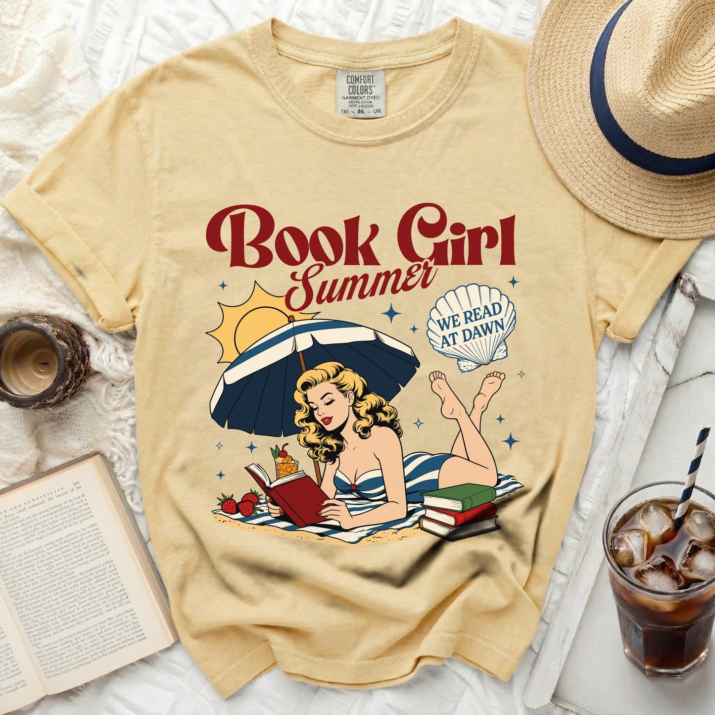 Cream t-shirt with "Book Girl Summer" graphic and a retro pin-up reading a book.