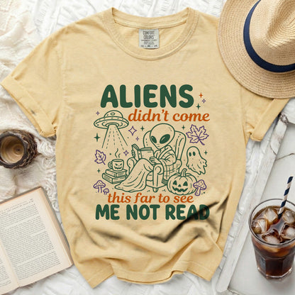 Yellow t-shirt with alien reading and text "Aliens didn't come this far to see me not read."